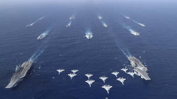 Massive Chinese naval drills featuring both of the PLAN's operational aircraft carriers. Image released October 31, 2024. - Sputnik International