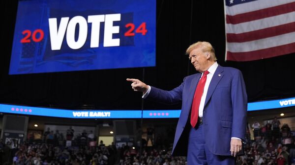 Republican presidential nominee former President Donald Trump arrives at a campaign rally at the Bryce Jordan Center, Saturday, Oct. 26, 2024, in State College, Pa - Sputnik International