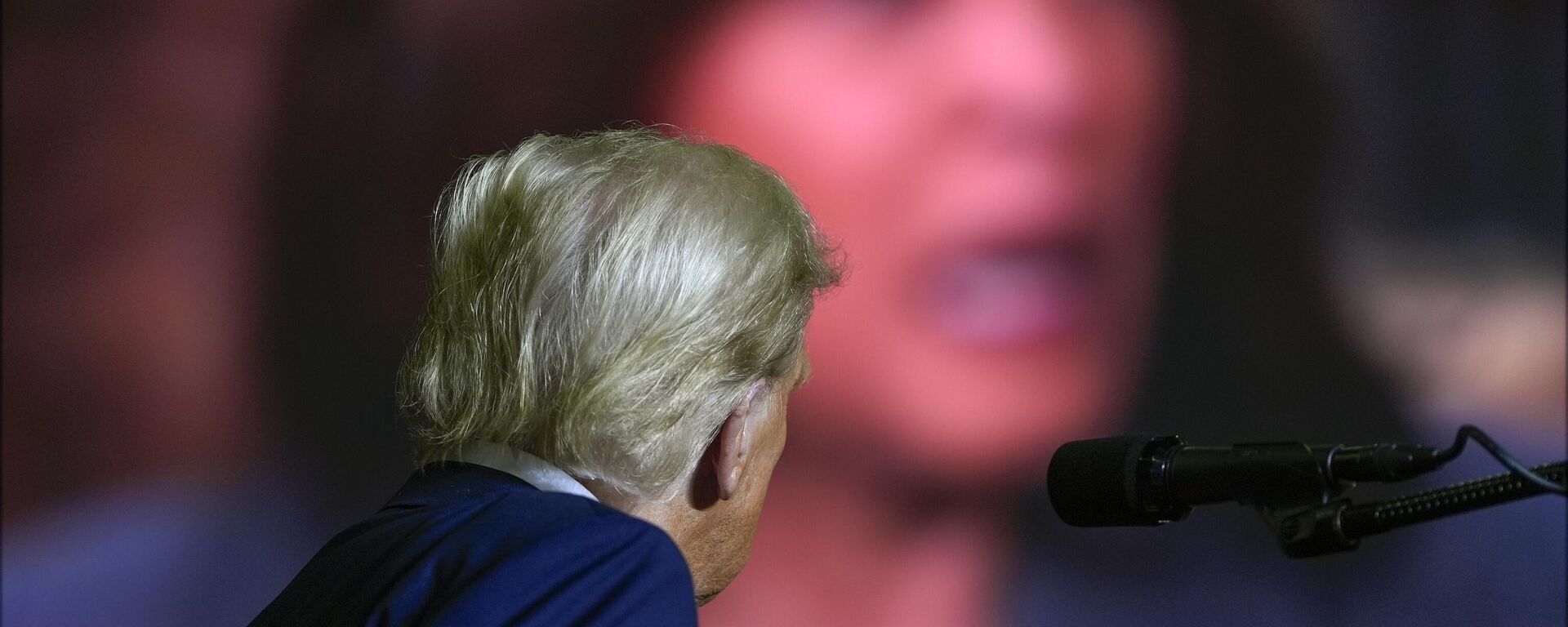 Republican presidential nominee former President Donald Trump watches a video featuring Democratic presidential nominee Vice President Kamala Harris as he speaks at a campaign rally at PPL Center, Tuesday, Oct. 29, 2024, in Allentown, Pa. - Sputnik International, 1920, 06.11.2024