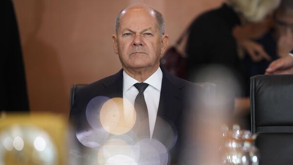 German Chancellor Olaf Scholz arrives for the cabinet meeting of the government at the chancellery in Berlin, Germany, Wednesday, Oct. 9, 2024.  - Sputnik International