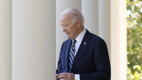 President Joe Biden walks to speak in the Rose Garden of the White House in Washington, Thursday, Nov. 7, 2024.  - Sputnik International