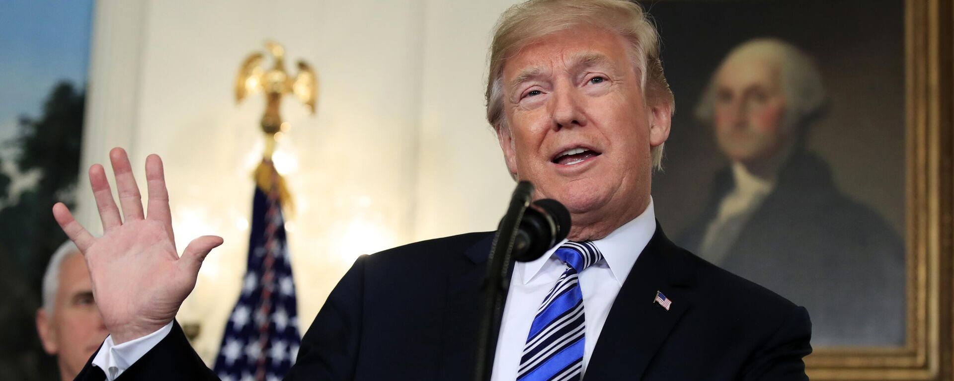 In this March 23, 2018, photo, President Donald Trump speaks in the Diplomatic Room of the White House in Washington. A growing American economy and passage of a Republican tax overhaul appear to be helping Trump lift his approval ratings from historic lows - Sputnik International, 1920, 18.12.2024