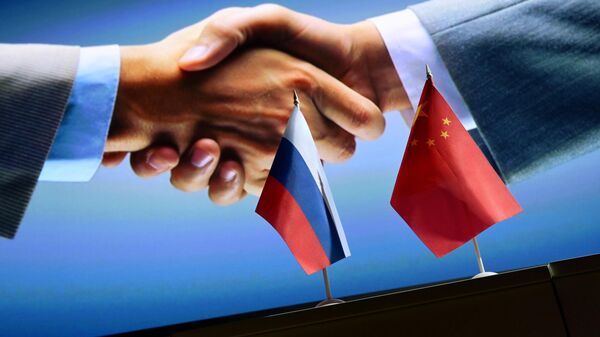  Russian and Chinese flags.File photo - Sputnik International