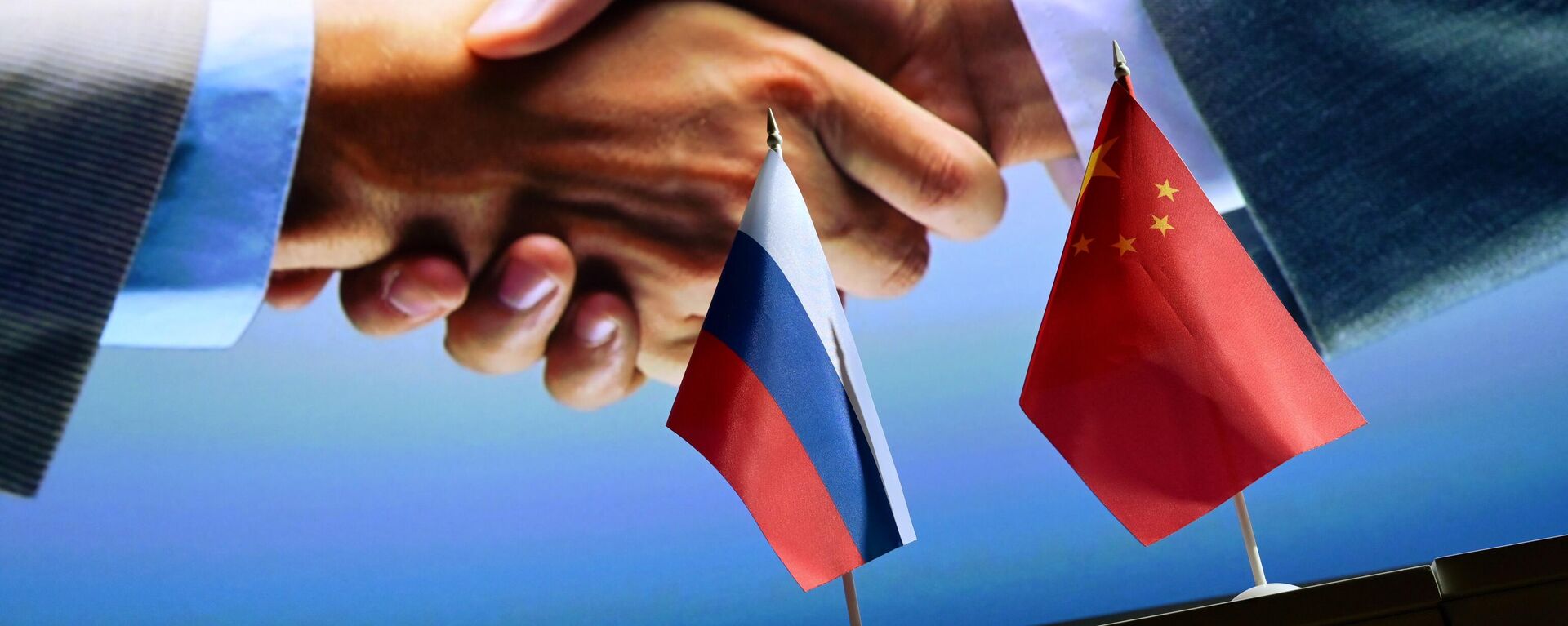  Russian and Chinese flags.File photo - Sputnik International, 1920, 29.08.2025