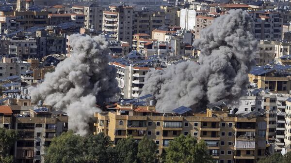 Smoke rises after an Israeli airstrike on Dahiyeh, in the southern suburb of Beirut, Lebanon, Tuesday, Nov. 12, 2024. - Sputnik International