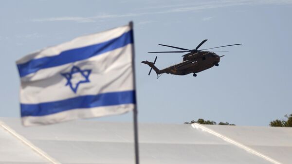 An Israeli military Helicopter carrying released soldier Gilad Schalit lands at Tel-Nof Air Force base, central Israel. - Sputnik International