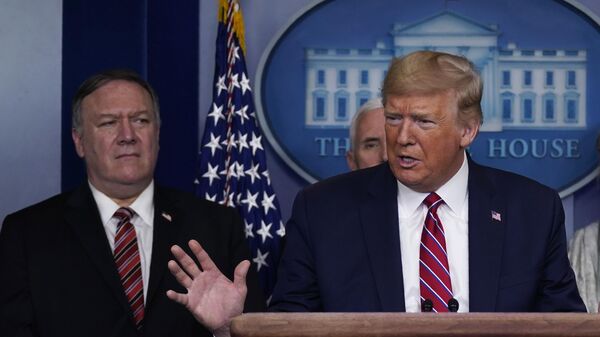 In this March 20, 2020, file photo, with then-Secretary of State Mike Pompeo to the rear, then-US President Donald Trump speaks during a coronavirus task force briefing at the White House in Washington. - Sputnik International