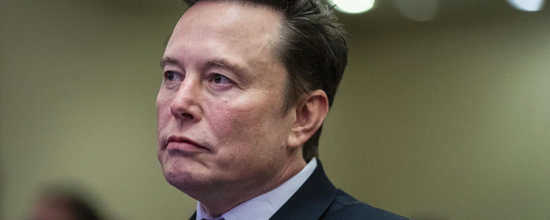 Elon Musk listens as President-elect Donald Trump speaks during a meeting with the House GOP conference, Wednesday, Nov. 13, 2024, in Washington - Sputnik International, 1920, 04.07.2025