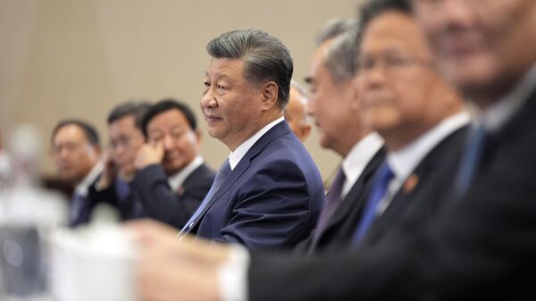 Chinese President Xi Jinping meets with President Joe Biden during a bilateral meeting, Saturday, Nov. 16, 2024, in Lima, Peru.  - Sputnik International