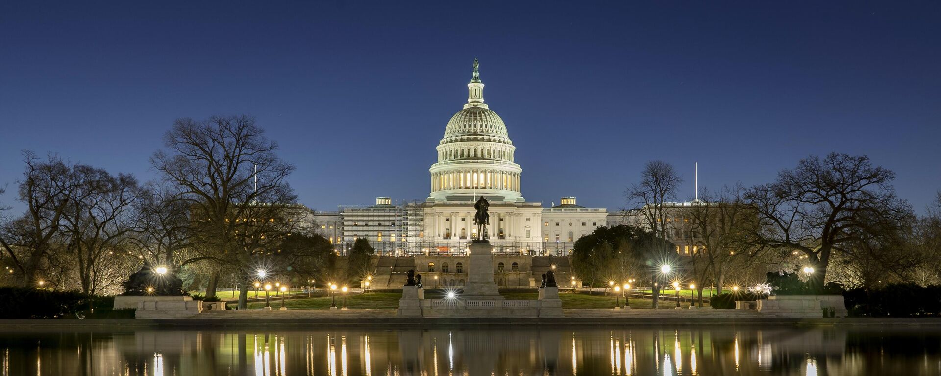 The US Capitol building is seen before sunrise on Capitol Hill in Washington, Monday, March. 21, 2022. The US Capitol building is seen before sunrise on Capitol Hill in Washington, Monday, March. 21, 2022. - Sputnik International, 1920, 07.11.2025