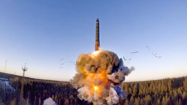 In this file photo taken from a video distributed by Russian Defense Ministry Press Service, on Wednesday, Dec. 9, 2020, a rocket launches from missile system as part of a ground-based intercontinental ballistic missile test launched from the Plesetsk facility in northwestern Russia - Sputnik International