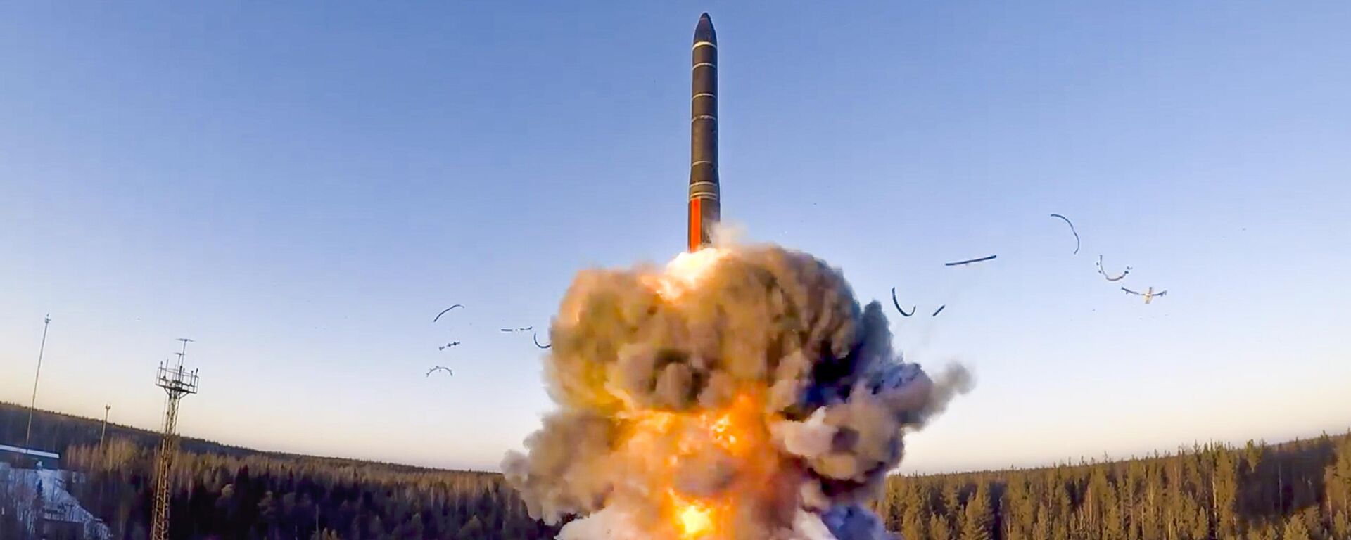 In this file photo taken from a video distributed by Russian Defense Ministry Press Service, on Wednesday, Dec. 9, 2020, a rocket launches from missile system as part of a ground-based intercontinental ballistic missile test launched from the Plesetsk facility in northwestern Russia - Sputnik International, 1920, 30.11.2024