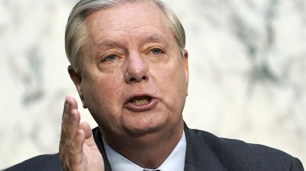 Senate Judiciary Committee Chairman Lindsey Graham, R-S.C., questions Supreme Court nominee Amy Coney Barrett during the second day of her confirmation hearing before the Senate Judiciary Committee on Capitol Hill in Washington, Tuesday, Oct. 13, 2020 - Sputnik International