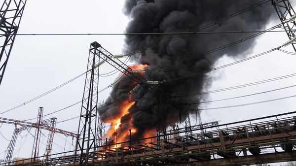 Flames and smoke rise from a blaze at an electricity facility after a Russian attack in Kharkov, Ukraine, March 22, 2024.  - Sputnik International