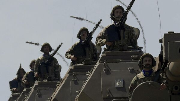 Cypriot soldiers on top of armored vehicles during a military parade marking the 64th anniversary of Cyprus' independence from British colonial rule, in Nicosia, Cyprus, Tuesday, Oct. 1 2024. - Sputnik International