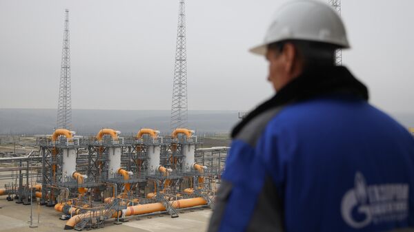 An employee looks over at Kazachya gas compressor station, a facility of Gazprom's TurkStream gas pipeline, in Krasnodar region, Russia. - Sputnik International