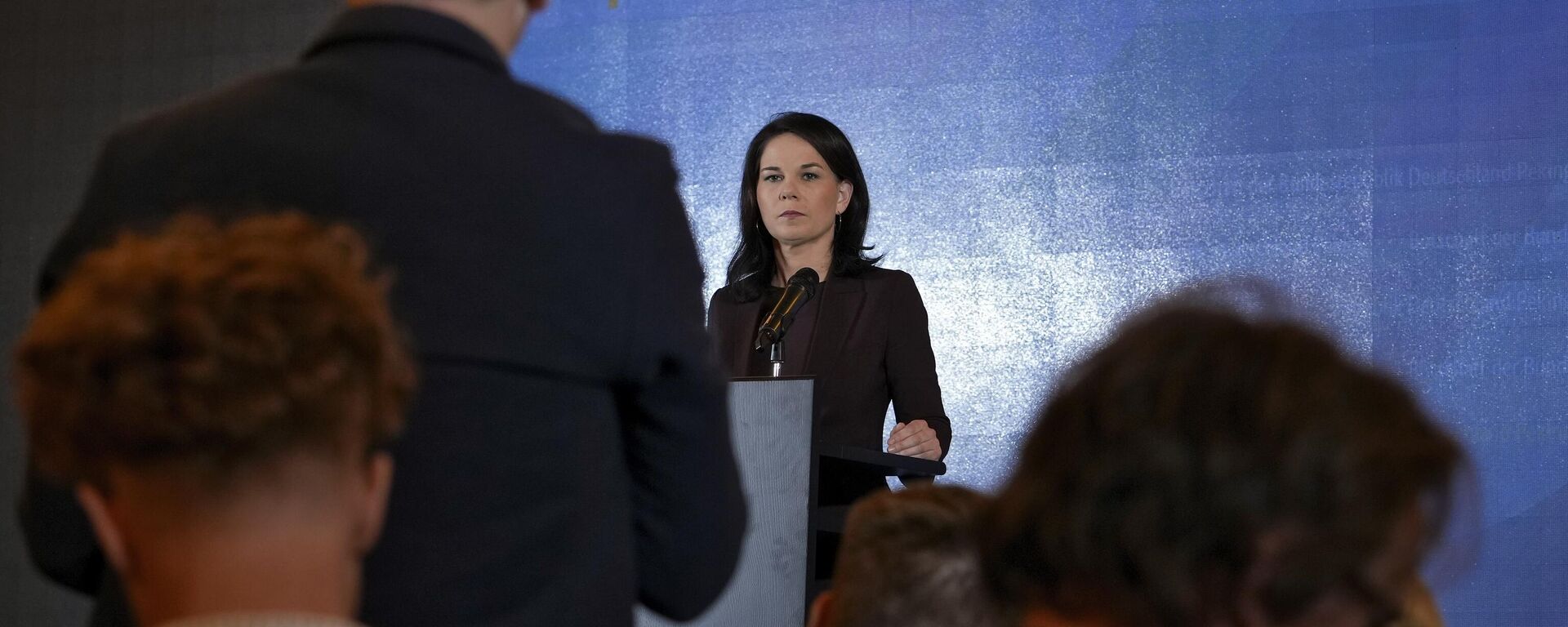 German Foreign Minister Annalena Baerbock listens to a question from a journalist during a press briefing at a hotel in Beijing, Monday, Dec. 2, 2024.  - Sputnik International, 1920, 03.12.2024