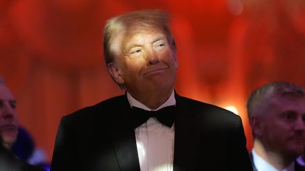 President-elect Donald Trump listens during an America First Policy Institute gala at his Mar-a-Lago estate, Thursday, Nov. 14, 2024, in Palm Beach, Fla.  - Sputnik International