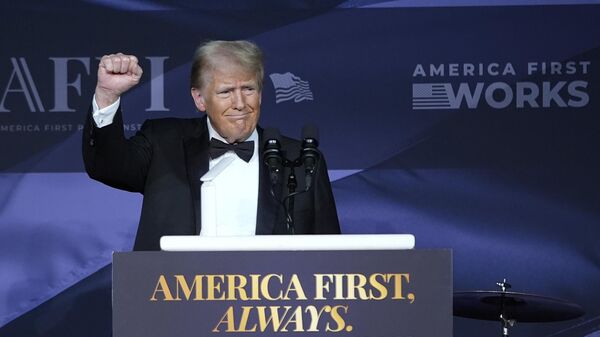 President-elect Donald Trump gestures after speaking during an America First Policy Institute gala at his Mar-a-Lago estate, Thursday, Nov. 14, 2024, in Palm Beach, Fla.  - Sputnik International