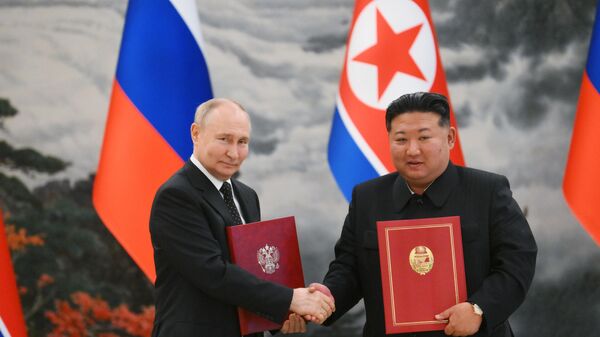 Russian President Vladimir Putin and North Korean leader Kim Jong-un attend a reception at the Mongnangwan Reception House in Pyongyang, North Korea, June 19, 2024 - Sputnik International