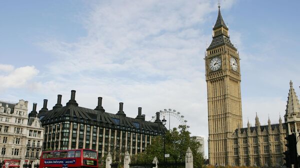 An overview picture showing traffic passing by the Houses of Parliament in London, Monday Oct. 25, 2004.  - Sputnik International