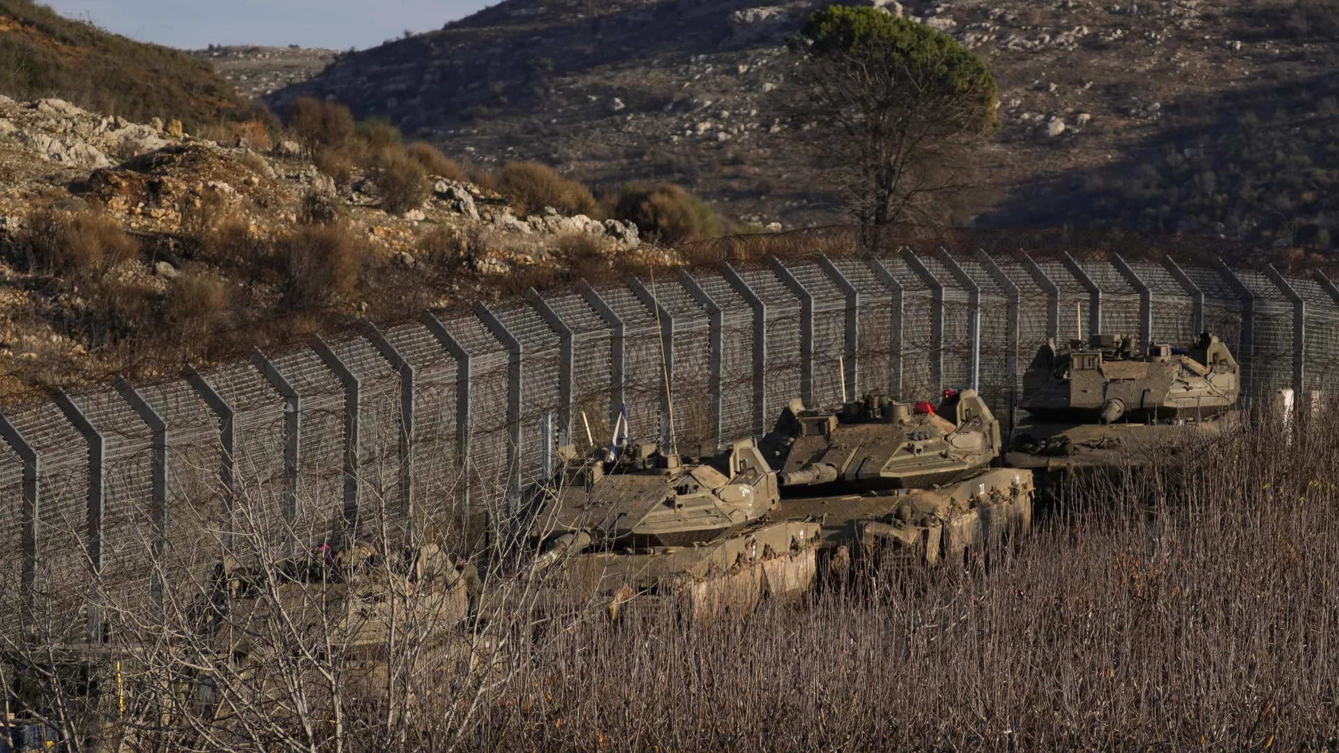 Israeli armored vehicles park along the so-called Alpha Line that separates the Israeli-annexed Golan Heights from Syria, Sunday, Dec. 8, 2024.  - Sputnik International, 1920, 21.12.2024