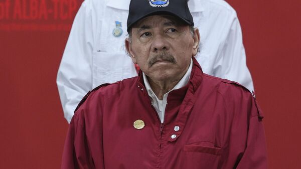 Nicaragua's President Daniel Ortega, stands for a group photo at a summit by the Bolivarian Alliance for the Peoples of Our America (ALBA) in Caracas, Venezuel. - Sputnik International