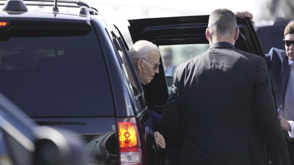 US President Joe Biden gets ready to depart from Amilcar Cabral international airport on Sal island, Cape Verde Monday, Dec. 2, 2024, en route to Angola.  - Sputnik International