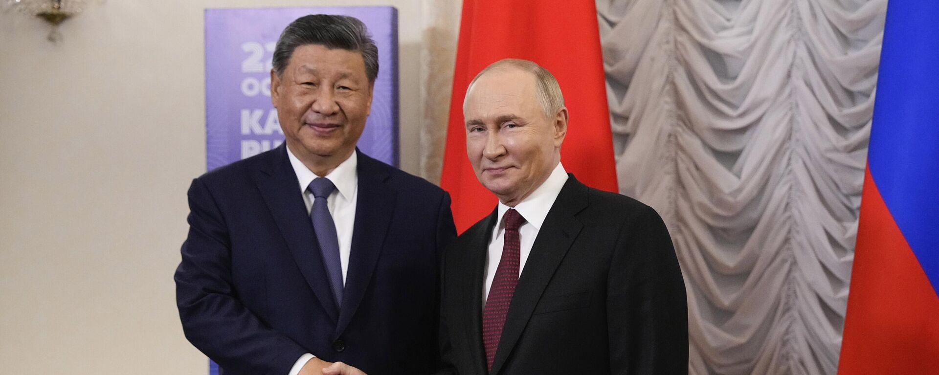 Russian President Vladimir Putin, right, and Chinese President Xi Jinping shake hands during their meeting on the sidelines of BRICS Summit at Kazan Kremlin in Kazan, Russia, Tuesday, Oct. 22, 2024. Russian President Vladimir Putin, right, and Chinese President Xi Jinping shake hands during their meeting on the sidelines of BRICS Summit at Kazan Kremlin in Kazan, Russia, Tuesday, Oct. 22, 2024. - Sputnik International, 1920, 16.10.2025