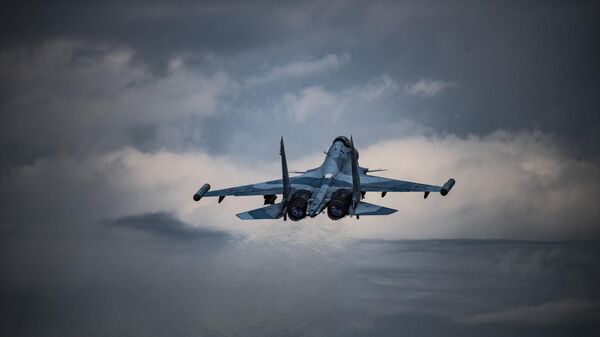 A Sukhoi Su-30SM fighter jet of the Russian Aerospace Forces flies, in the course of Russia's special military operation - Sputnik International