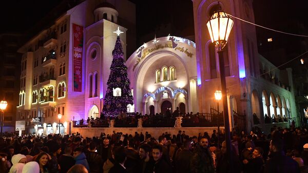 People celebrate Christmas on the street in Latakia - Sputnik International