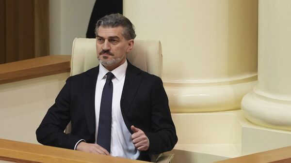 Georgian president-elect Mikheil Kavelashvili attends a Georgian parliament session in Tbilisi, Georgia, Saturday. Dec. 14, 2024.  - Sputnik International