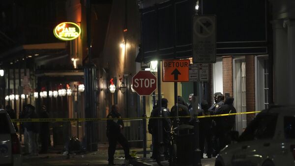 Emergency services attend the scene after a vehicle drove into a crowd on New Orleans' Canal and Bourbon Street - Sputnik International