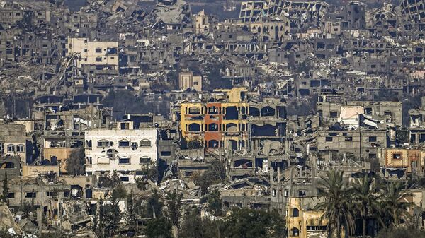 A destroyed part of Gaza City as seen from southern Israel, Thursday Jan. 2, 2025. - Sputnik International