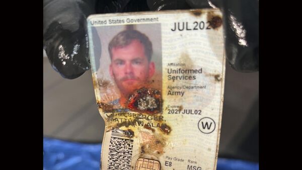 This undated photo, provided by the Las Vegas Police Department shows an ID belonging to Matthew Livelsberger, found inside a Tesla Cybertruck involved in an explosion outside the Trump Hotel in Las Vegas. - Sputnik International