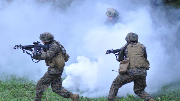 US servicemen during the Rapid Trident/Saber Guardian 2015 military exercises at the International Peacekeeping and Security Centre base outside Lviv, Ukraine, Friday, July 24, 2015.  - Sputnik International