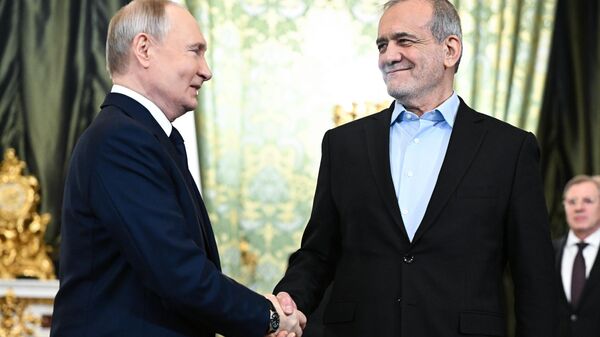 Russian President Vladimir Putin during a meeting with Iranian President Masoud Pezeshkian. - Sputnik International