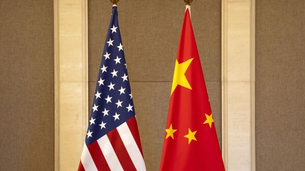 US and Chinese flags are set up at the Diaoyutai State Guesthouse in Beijing, on July 8, 2023. - Sputnik International