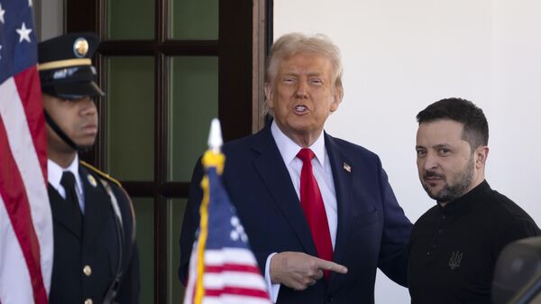 Ukraine's Volodymyr Zelensky, right, is greeted by President Donald Trump, center, as he arrives at the White House in Washington, Friday, Feb. 28, 2025.  - Sputnik International