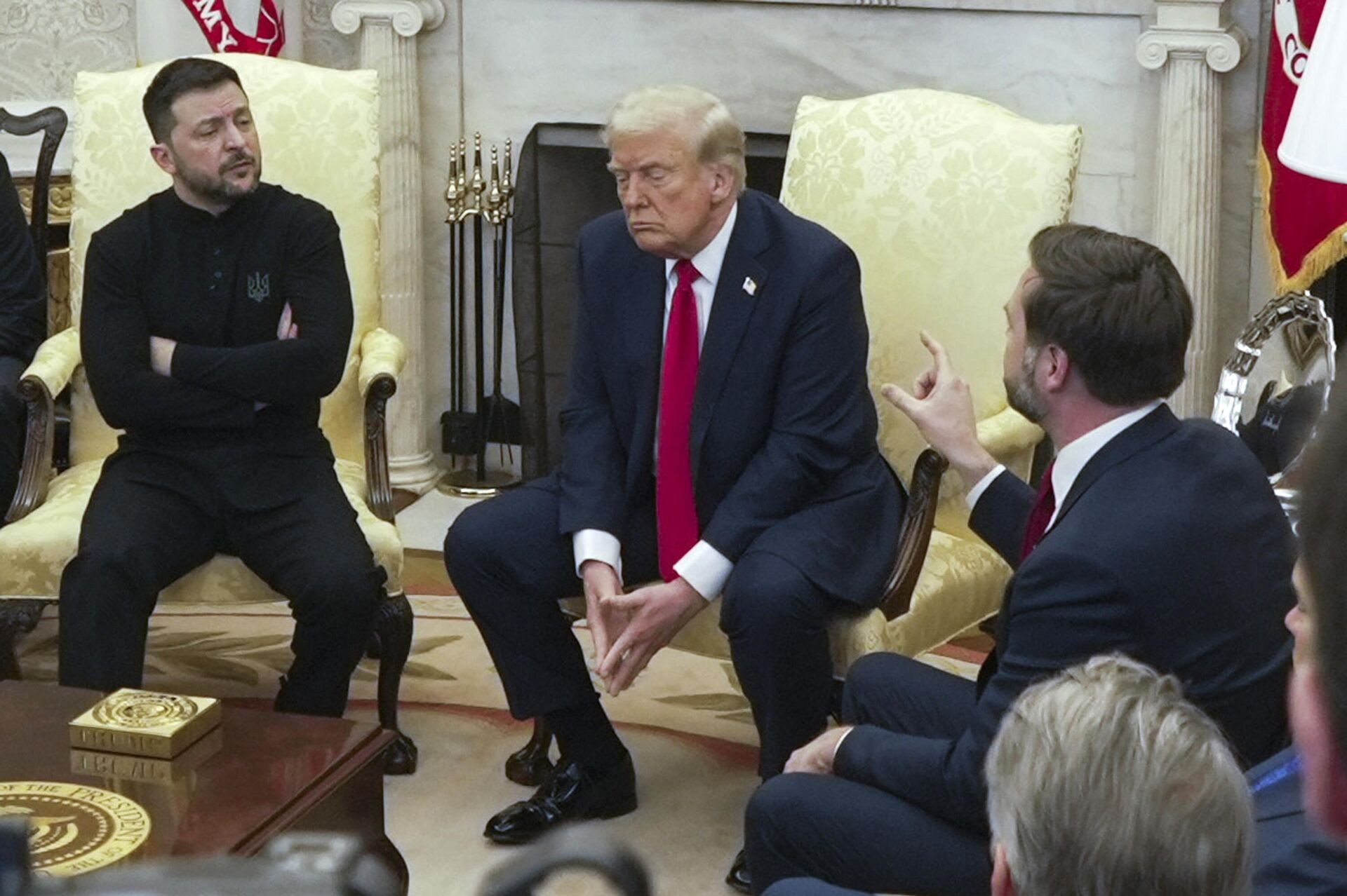 Vice President JD Vance, right, speaks with Ukraine's Volodymyr Zelensky, left, as President Donald Trump listens in the Oval Office at the White House, Friday, Feb. 28, 2025, in Washington.  - Sputnik International, 1920, 01.03.2025