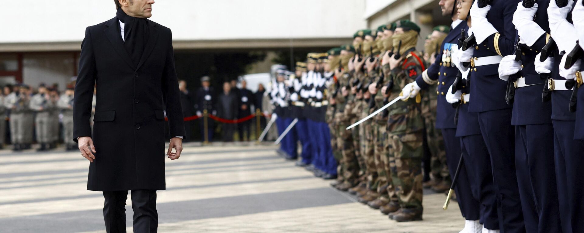 French President Emmanuel Macron reviews the troops during a military ceremony during a visit at the Digital Support and Cyber Command (CATNC) of the French Army as part of his New Year address to the Armed Forces, in Cesson-Sevigne, western France, Monday, Jan. 20, 2025.  - Sputnik International, 1920, 30.04.2025