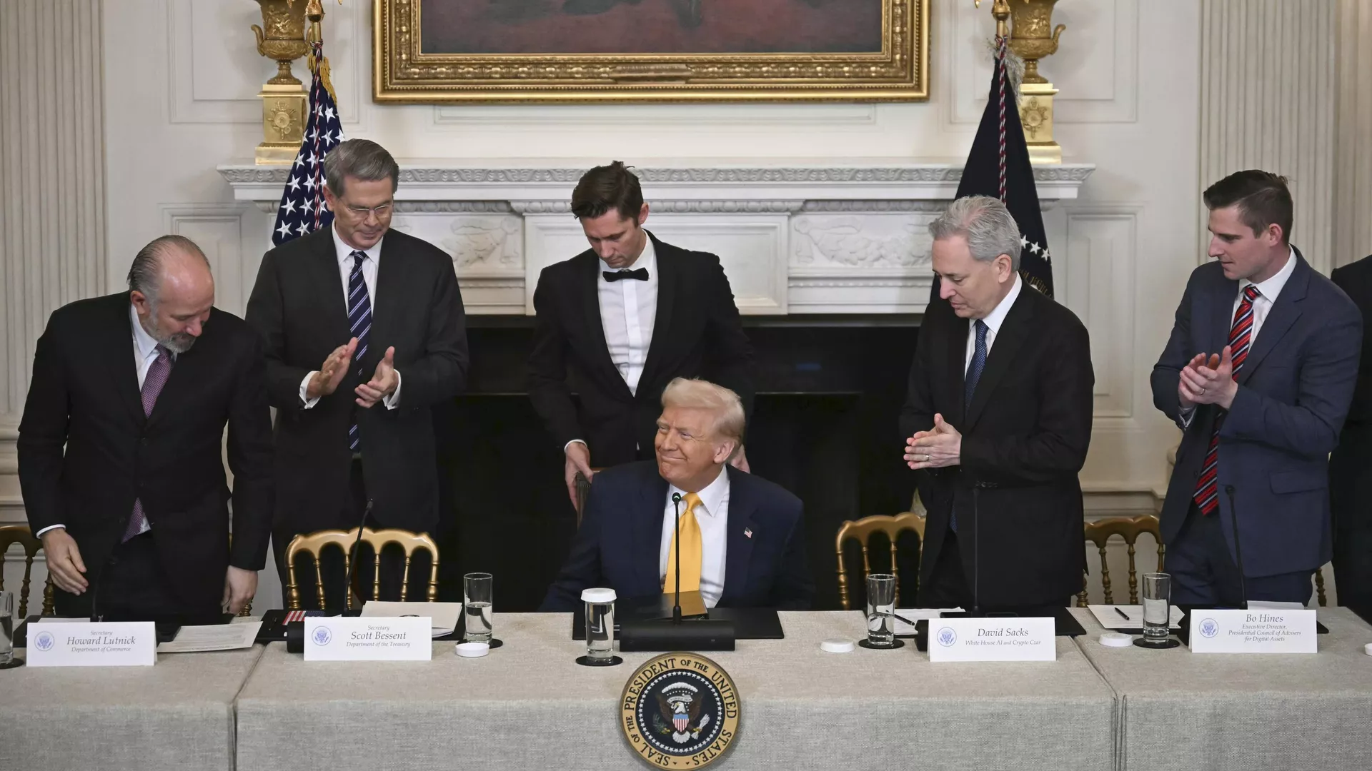 President Donald Trump, center, sits as Secretary of Commerce Howard Lutnick, from left, Treasury Secretary Scott Bessent, and from right, Bo Hines, a member of the presidential council of advisers for digital assets, and White House AI and crypto czar David Sacks attend the White House Crypto Summit in Washington, Friday, March 7, 2025.  - Sputnik International, 1920, 09.03.2025