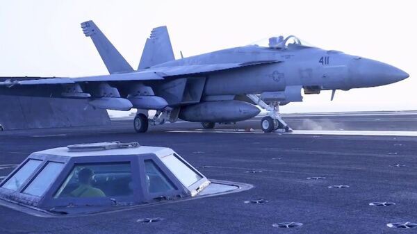 This image taken from video provided by the U.S. Navy shows an aircraft launching from the USS Harry S. Truman in the Red Sea before airstrikes in Sanaa, Yemen, Saturday, March 15, 2025. - Sputnik International