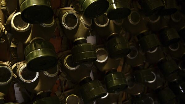 FILE - Gas masks hang on the wall at the Rock Nuclear Bunker Museum in Budapest, Hungary. - Sputnik International