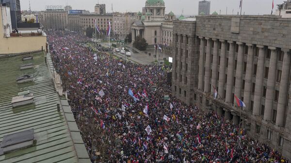 Tens of thousands gather in front of the Serbian parliament during a protest in Belgrade, Serbia, Saturday, March 15, 2025 - Sputnik International