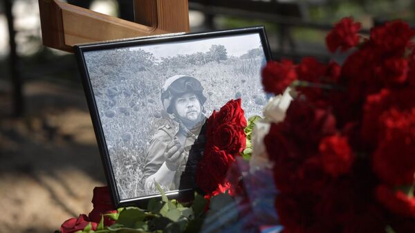 A portrait of RIA Novosti war correspondent Rostislav Zhuravlev, who died in the special military operation zone on July 22, 2023. - Sputnik International