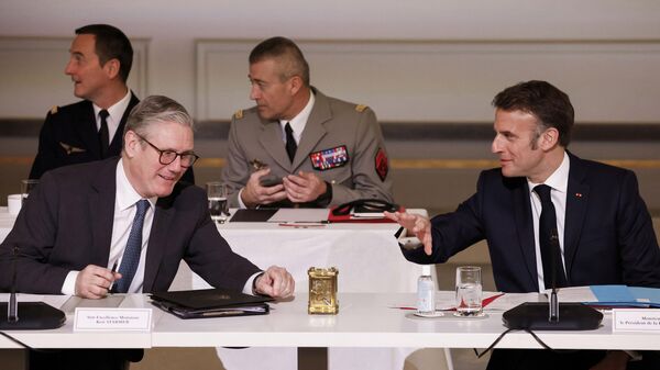 French President Emmanuel Macron, right, and Britain's Prime Minister Keir Starmer participate in the so-called Coalition of the willing summit at the Elysee Palace, Thursday, March 27, 2025. - Sputnik International