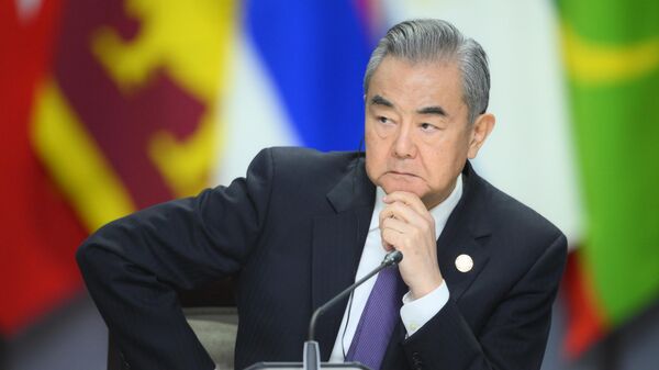 Chinese Foreign Minister Wang Yi, pictured here at the BRICS Summit in Kazan, Russia, October 23, 2024. File photo. - Sputnik International