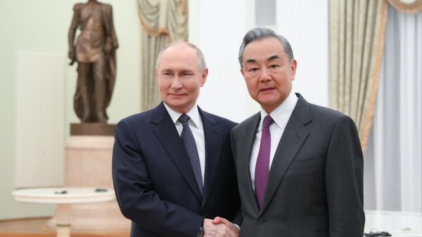 Vladimir Putin held talks Chinese Foreign Minister Wang Yi - Sputnik International
