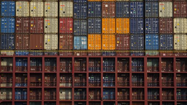 FILE - Containers are stacked on a cargo ship moving through the Panama Canal's Cocoli locks in Panama City, Feb. 21, 2025.  - Sputnik International